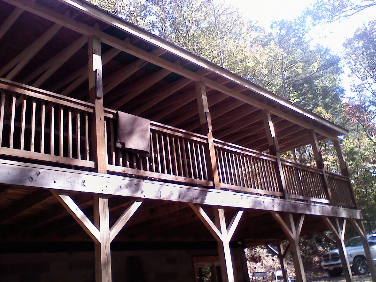 Timber framing under a new elevated porch and deck — Roof Leak Repair in Seville by Roofing Brothers